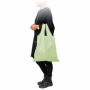 Foldable shopping bag with green elastic closure